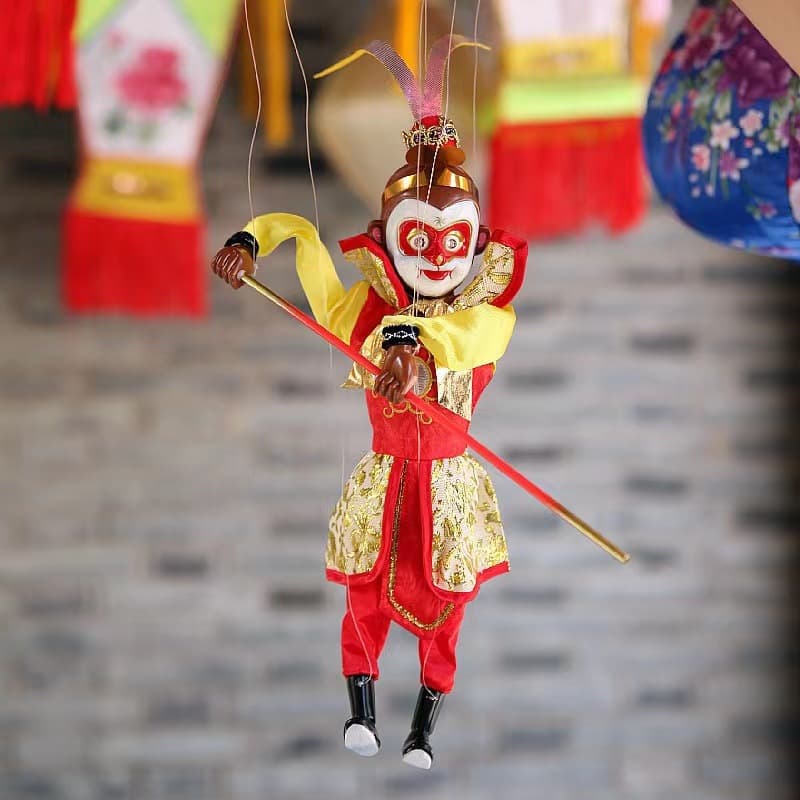 New style colorful flashing eye string Sun Wukong mascot electronic gift with light and music