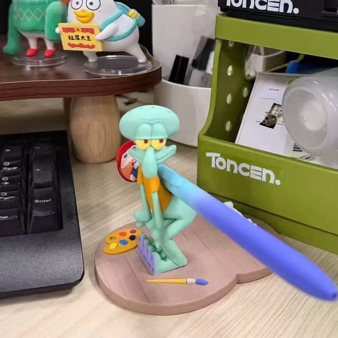 Cute and creative Squidward mobile phone desktop drama office ornaments violent lazy Squidward mobile phone holder