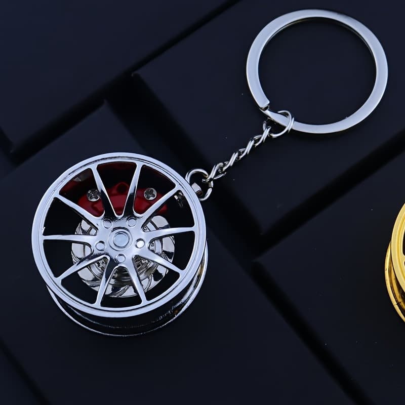 Metal brake hub rotating integrated gun black key pendant holiday gift Mercedes Benz wheel hub caliper key chain
