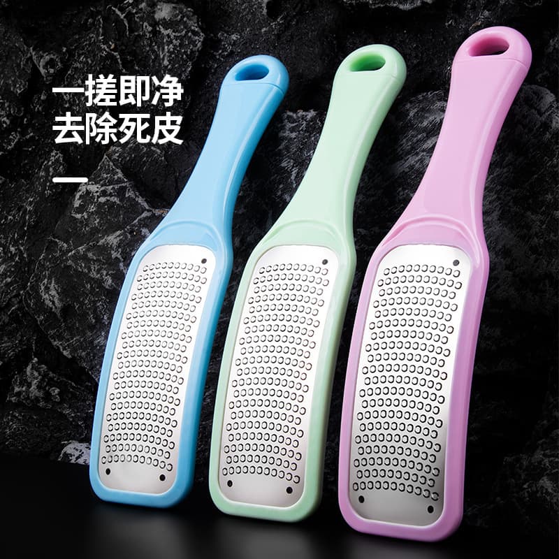 Perforated stainless steel foot file for home use - removes calluses and dead skin