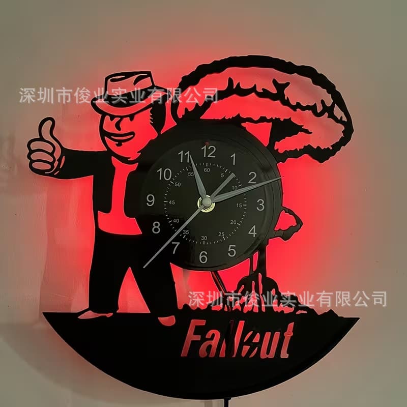 Fallout series themed vinyl record wall clock with Vault Boy and mushroom cloud design.