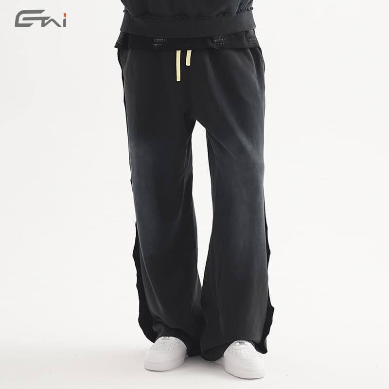 ETAI men's American street fashion spray-washed distressed trousers with loose edges and spliced retro men's straight casual pants