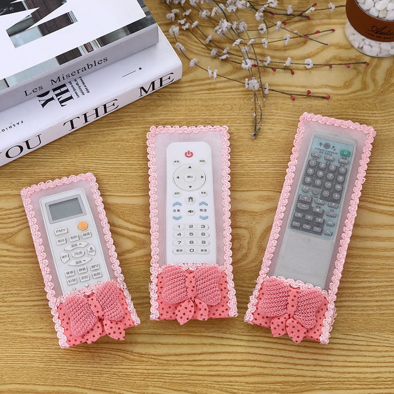 Free remote control cover, teddy bear fabric remote control cover, bow protective cover, wholesale TV and air conditioner remote control cover.