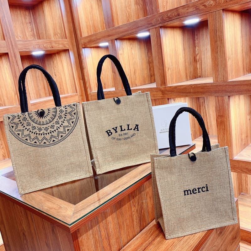 New portable handbag gift bag handheld packaging bag linen bag travel essential cotton and linen creative printed handbag