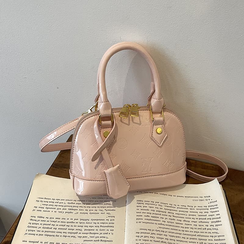 High-end new women's bag 2025 spring and summer shell bag niche design simple shoulder bag texture western style crossbody bag