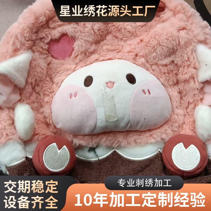 Toy embroidery with hand-quilted fabrics, playful and creative patterns, high-quality electronic embroidery for innovative handmade textiles.