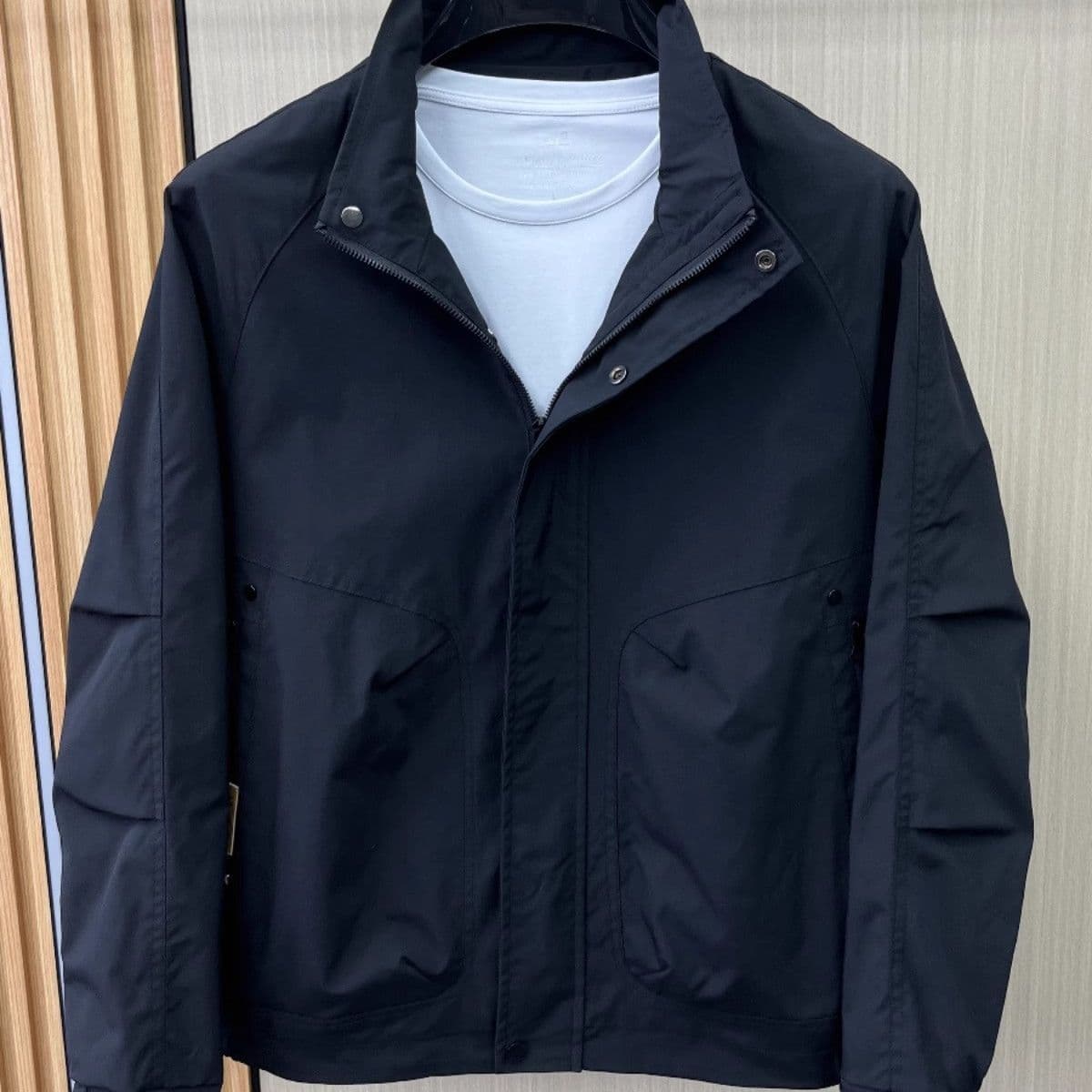 New stand-up collar men's spring and autumn jacket, casual and high-end men's slim fit American solid color workwear, simple and trendy.