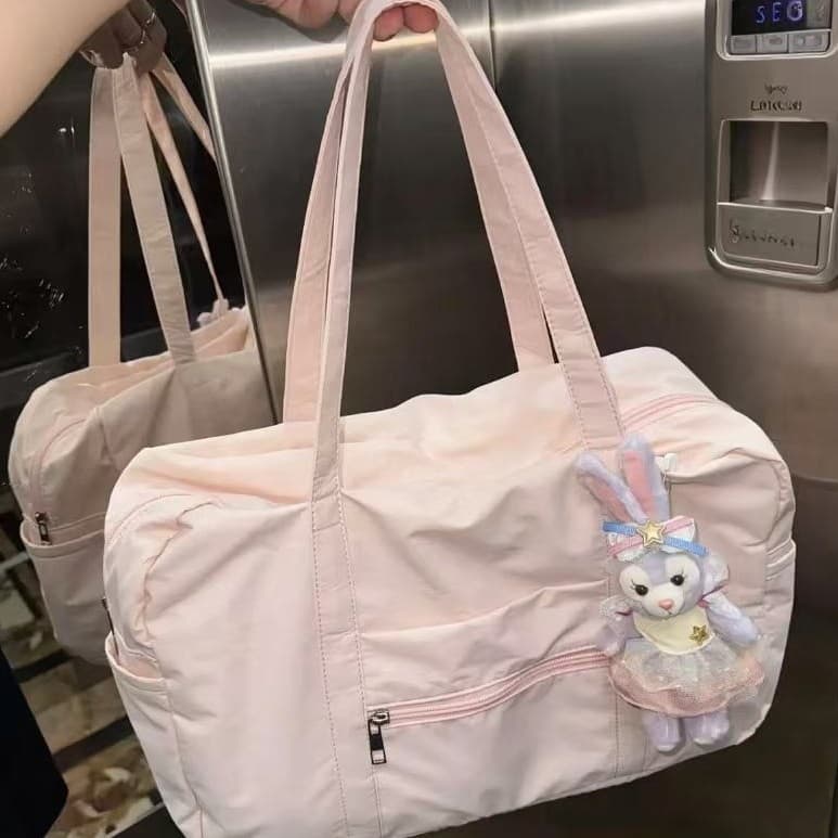 Pink tote bag, portable large-capacity travel bag, hand-held sports bag, stylish short-distance and good-looking luggage bag