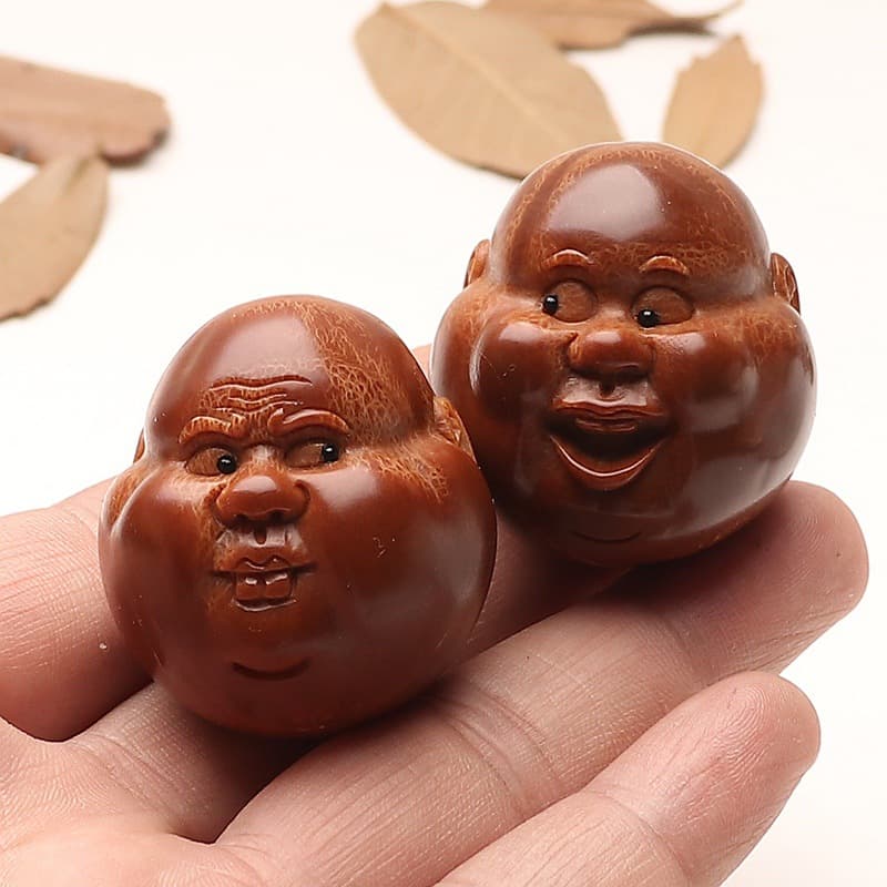 Factory direct supply of Brazilian large olive core hand-carved life handball core carving character health ball toy pieces