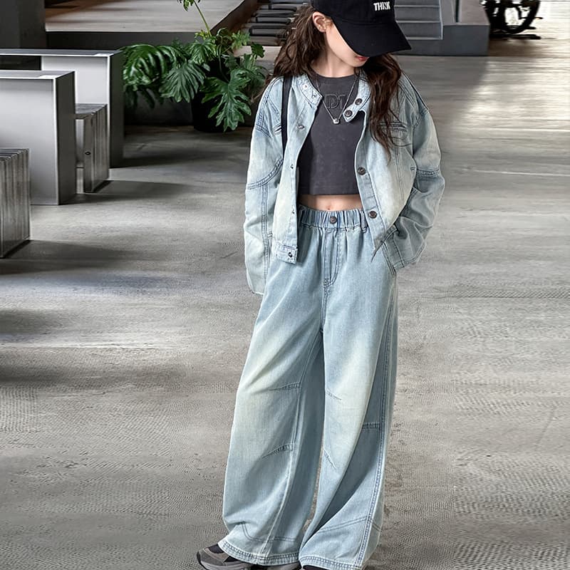 Girls' denim set with a sand-washed, distressed, vintage style. Perfect for medium and large girls. Two-piece denim outfit for easy matching and school attire.