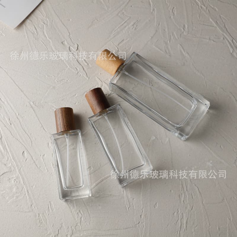 30ml 50ml 100ml Square Transparent Perfume Bottle with Wooden Cap Refillable Glass Bottle Press Spray Bottle