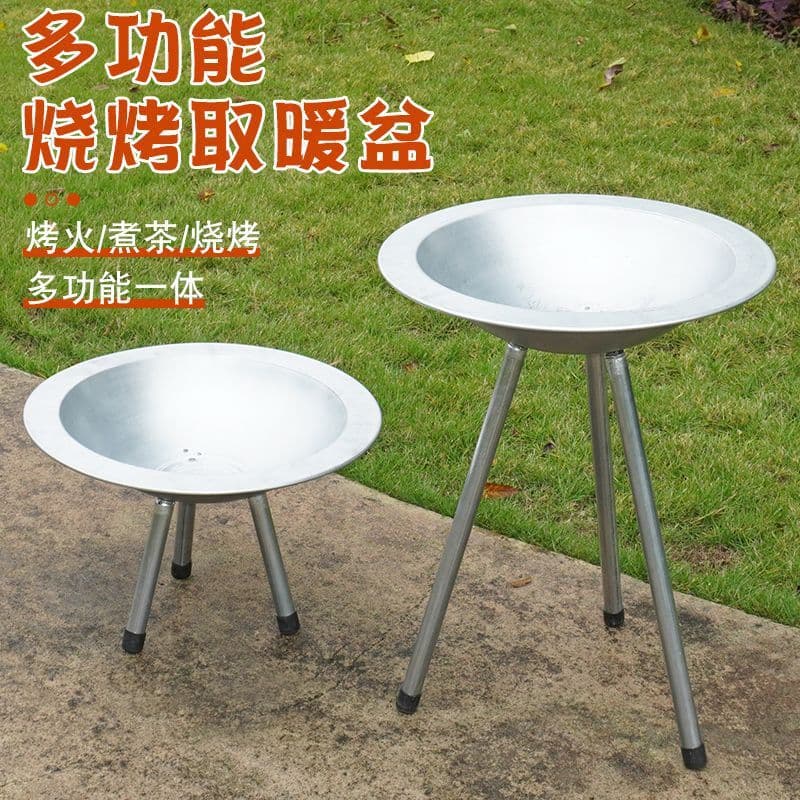 Large charcoal brazier, barbecue grill, old-fashioned fire pit, rural household firewood brazier