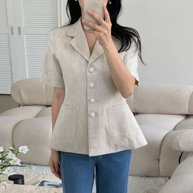 The size has been updated. The Korean style is simple and retro. Its elegant suit collar, single-breasted waist, short-sleeved suit and thin jacket.