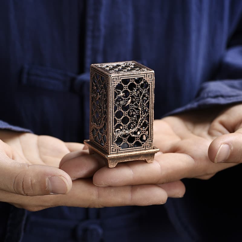 Chinese creative plum, orchid, bamboo and chrysanthemum square column hollow small incense burner indoor office tea room incense ornaments alloy aromatherapy burner