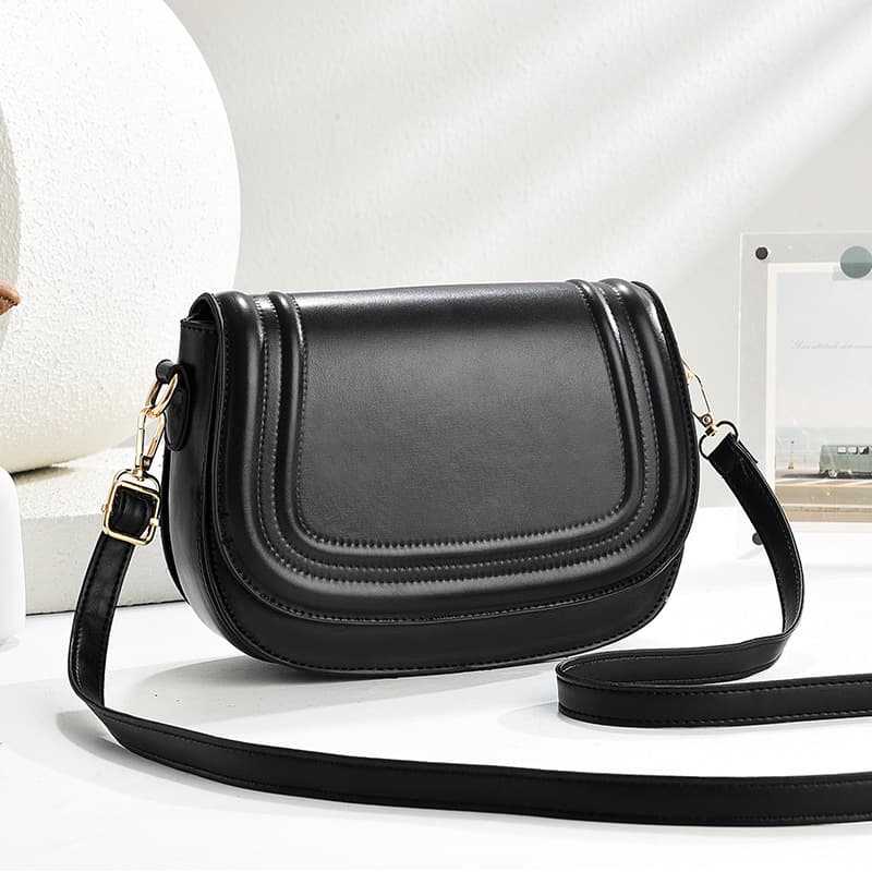 2025 New Saddle Bag Women's Bag Niche Design Horseshoe Bag Solid Color Flip Embossed Fashion Women's Crossbody Bag
