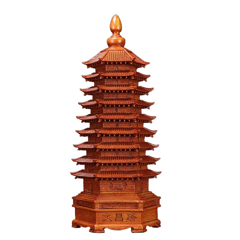 Nine- or thirteen-tier Wenchang Pagoda ornament with openings, made of rosewood, ebony, and peach wood.