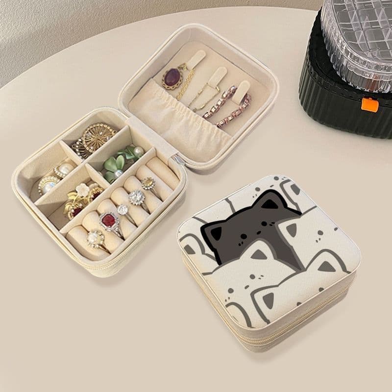 Small, portable jewelry box for earrings, studs, clip-on earrings, necklaces, rings, and other accessories. Compartments and anti-oxidation storage.