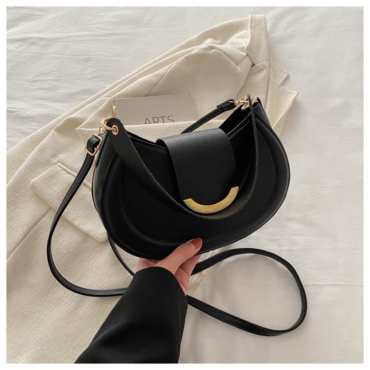 Korean-style chic fresh round textured solid color small handbag, fashionable for commuting, hand-carry, crossbody, and shoulder bag
