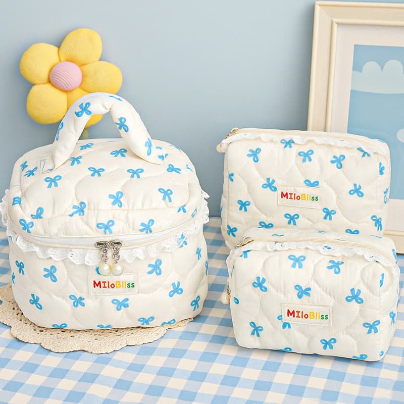 Niche design cute bow cosmetic bag high-end portable toiletry bag travel portable cosmetics storage bag