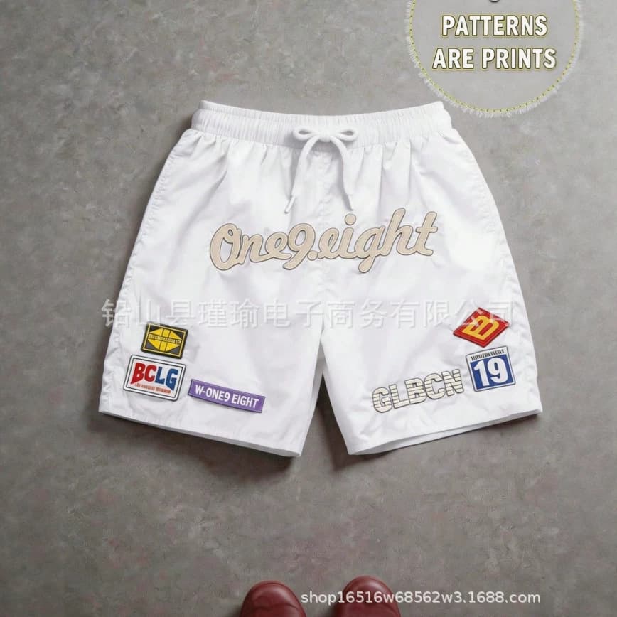 Cross-border hot style multi-color block letter printed white shorts, quick-drying fabric, loose American street style for men