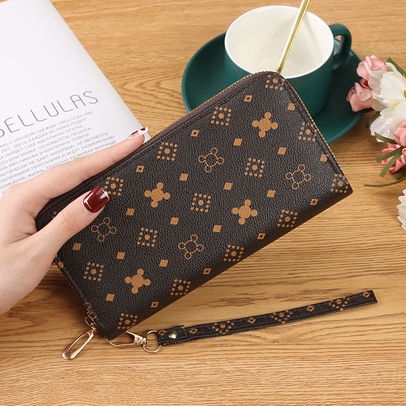 Source factory 2025 new women's wallet long multi-slot coin purse billfold zip clutch phone purse.