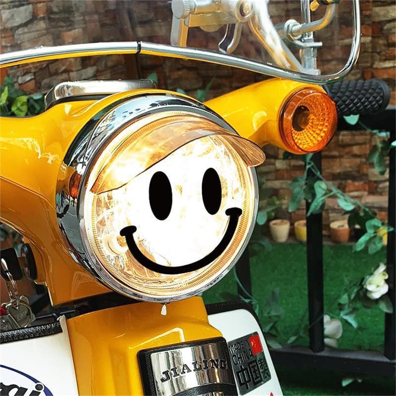 Cross-border hot-selling motorcycle headlight stickers, Jialing Coco smiley face film Cub calf Vespajango stickers