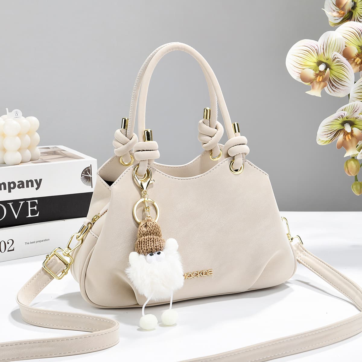 2026 New Korean Style Soft Cream Apricot Handbag with Knotted Handle Design Commuter Girl Crossbody Bucket Bag