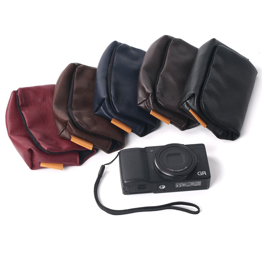 Portable case for Sony RX100 series cameras, G9X mirrorless cameras, and LX series storage bags.