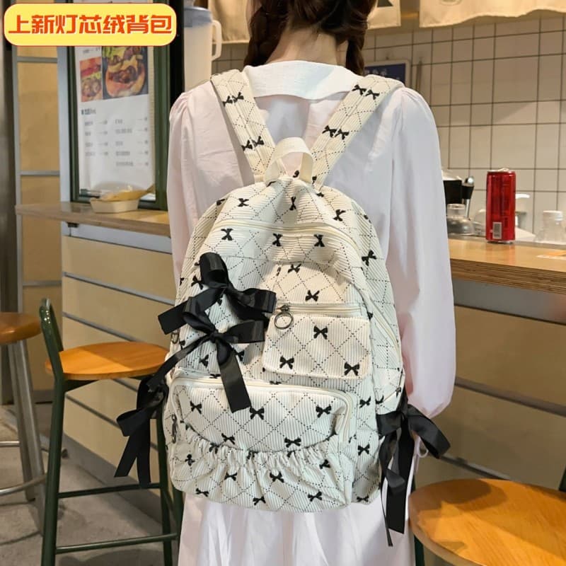 Cross-border ins wear-resistant schoolbag for middle school students, good-looking, practical and versatile backpack, teen bow backpack