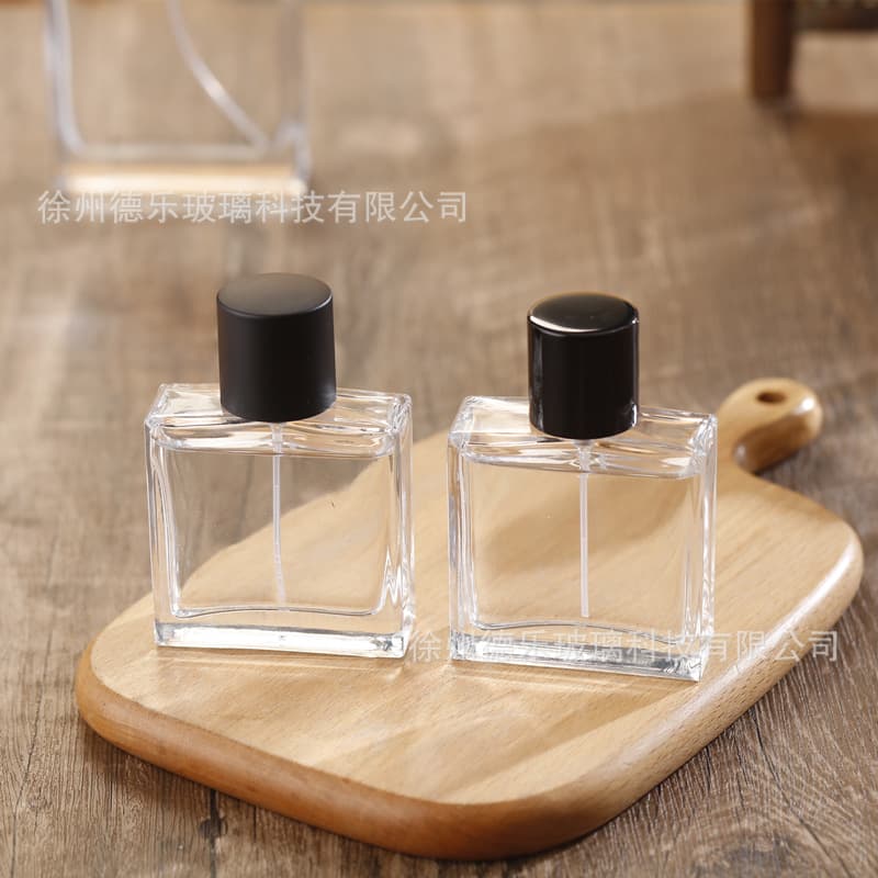 Glass Perfume Bottle 50ml 100ml Square Glass Cosmetic Press Spray Bottle Crimp Perfume Bottle with Black Cap