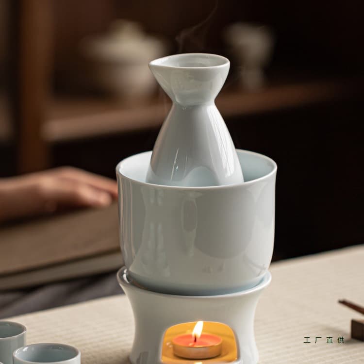 Home sake warmer set for yellow rice wine and white liquor, half-jin capacity, with one-ounce white liquor cups in a retro Japanese style.