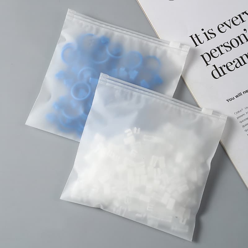 Small-sized storage and sealing bags available in dual-sided EVA frosted self-sealing bags for jewelry packaging with zipper closures.