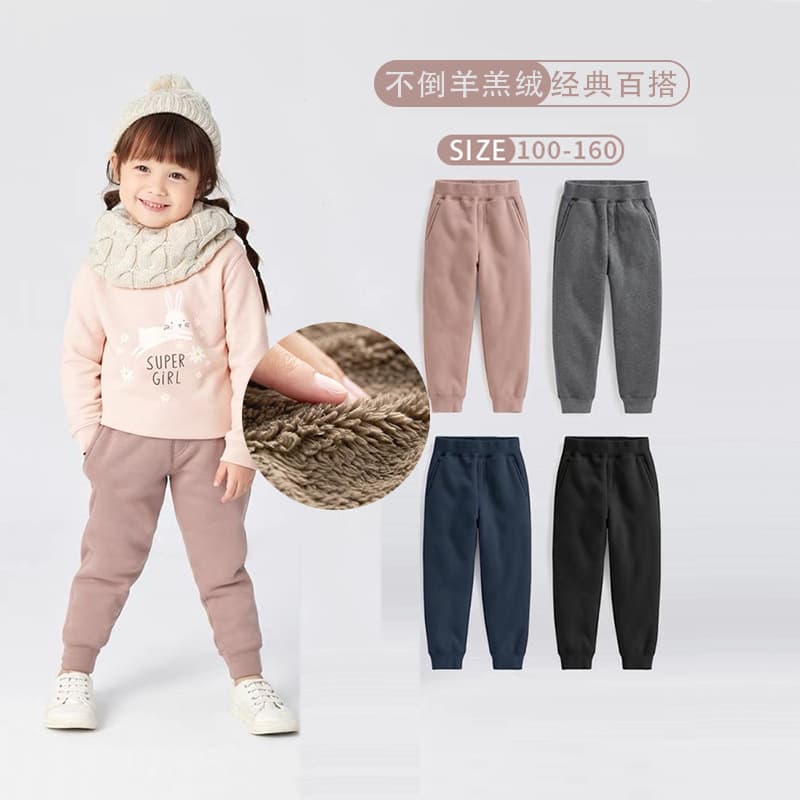 Winter children's fleece trousers with extra thickness, elastic waistband, and elastic cuffs for boys and girls.