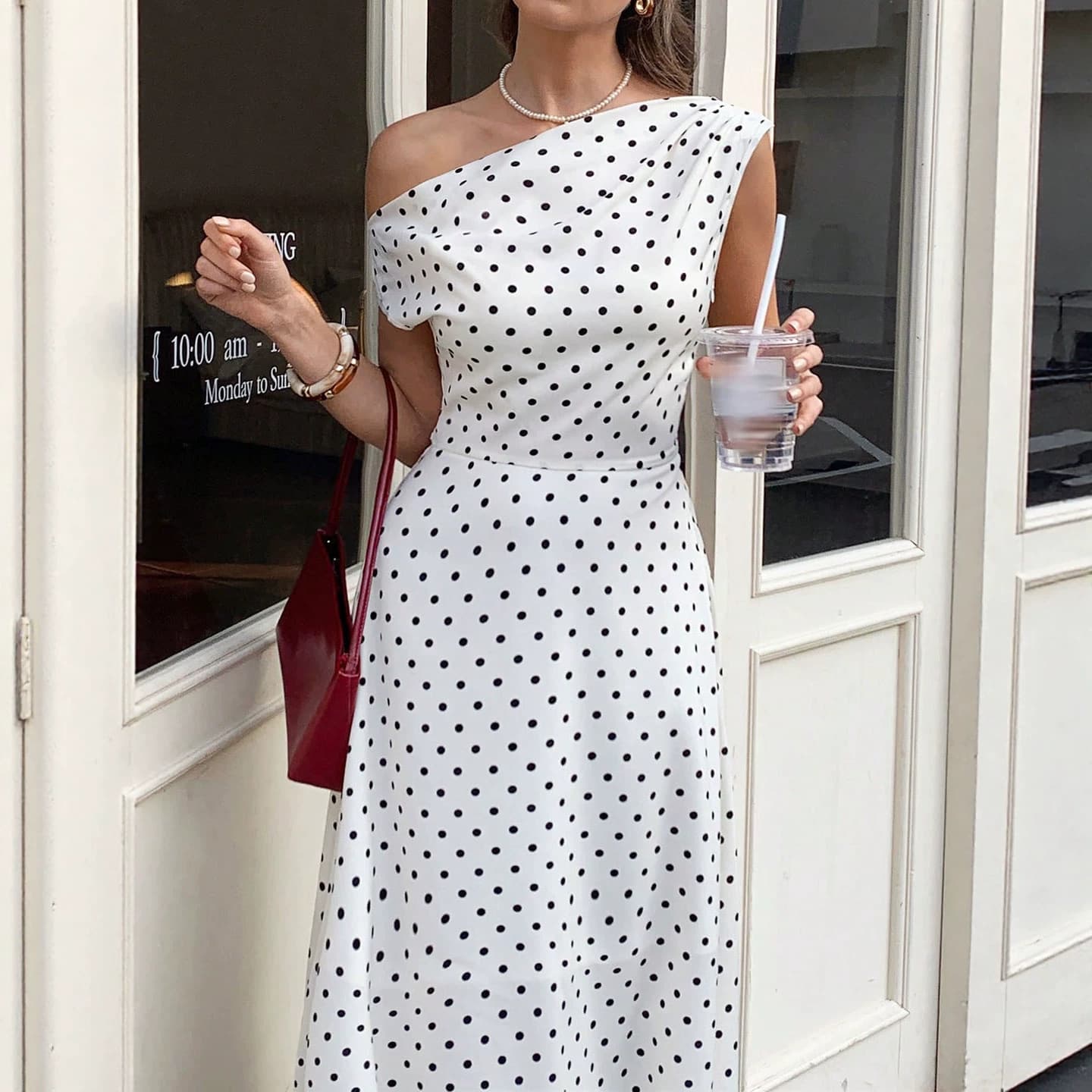 1688 specializes in European and American 2026 summer black and white polka dot oblique shoulder skirt off-shoulder waist A-line holiday dress