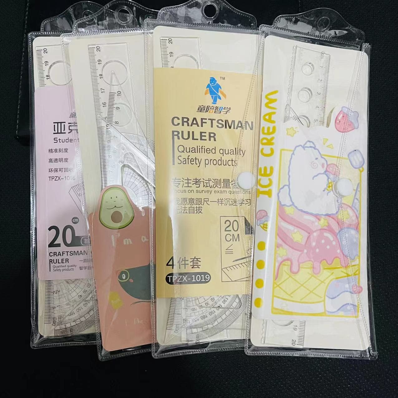 Ruler set for elementary school students, including straight rulers, protractors, and set squares. Four-piece set for students, priced at 2 yuan.
