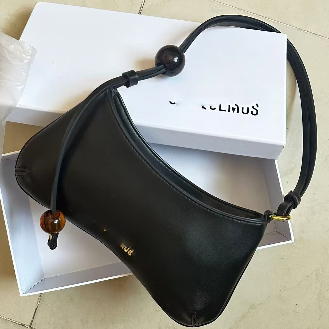 French light luxury JACQUE new style beaded shoulder underarm bag, fashionable and versatile baguette bag, simple round bead handbag