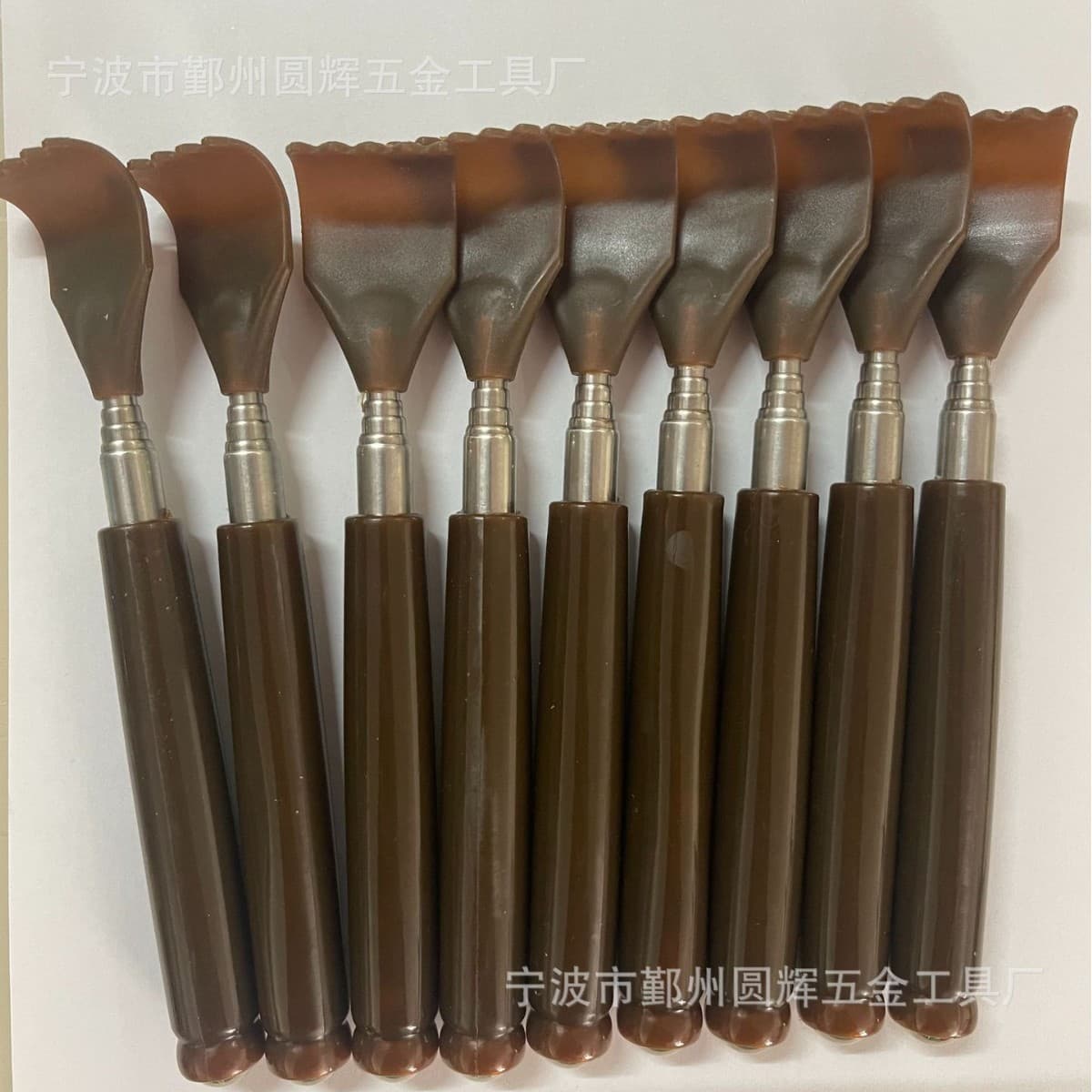 Stainless steel five-section telescopic itch scratcher without asking for help. Household back scratching rake. Scratching rake. Massage scratcher.
