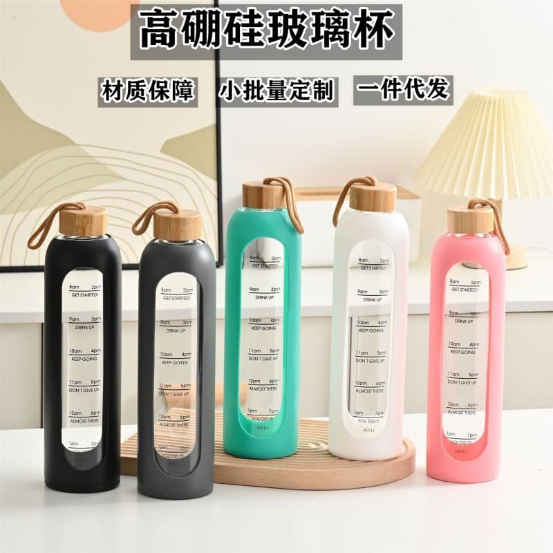 Wholesale Large Capacity Glass Cup with Bamboo Lid, Silicone Sleeve, Measurement Marks, Stylish Carry Rope Portable Water Bottle