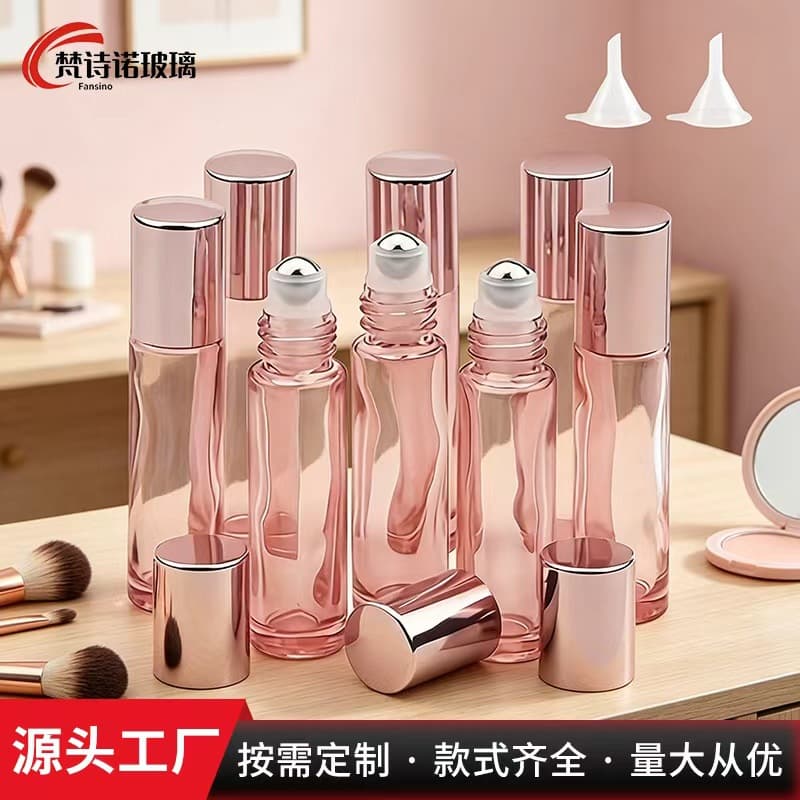 Cross-border transparent pink glass roller ball bottle, essential oil bottle, perfume roller ball bottle, head and eye massage bottle, therapy bottle, travel bottle