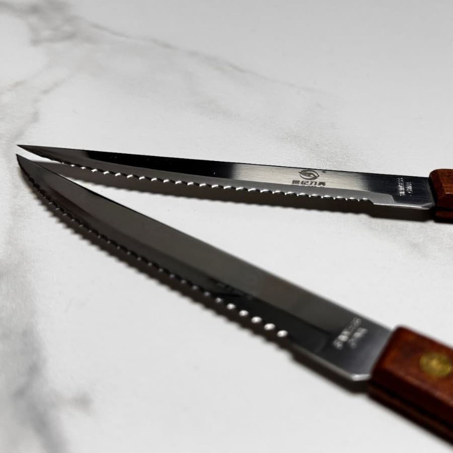 Stainless Steel Steak Knife with Real Wood Handle, Fine Serrated Blade for Outdoor Use on Amazon