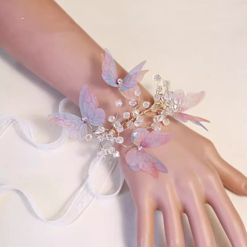 Beautiful and fresh forest-themed wedding bridal wrist corsage, bridesmaid bracelets, blue and pink butterfly crystal hand-tied flowers