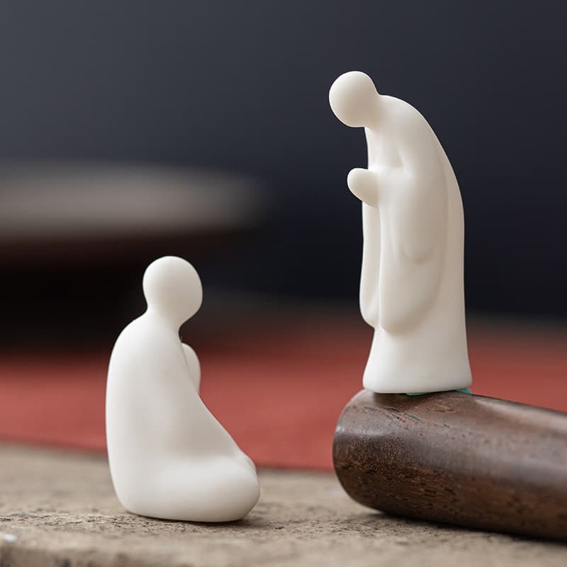 White Porcelain Small Creative Faceless Buddha Figurine Ornament for Living Room Tea Ceremony Zen Decor Accent Piece