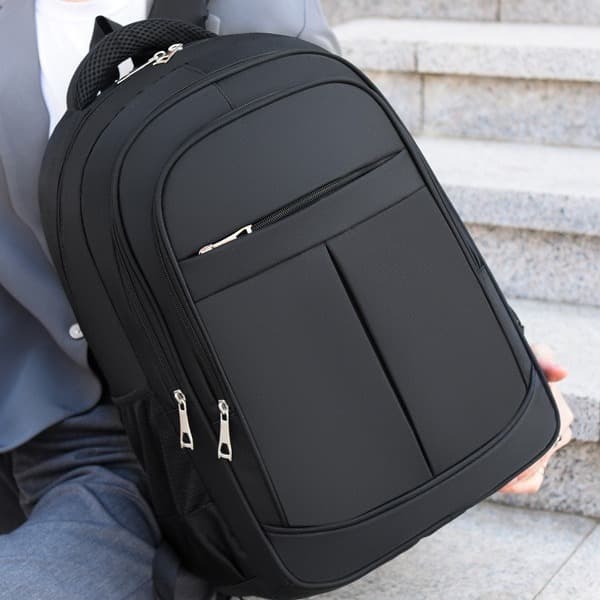 Large capacity, simple and versatile men's backpack for business commuting, suitable for college students and travel, trendy men's bag