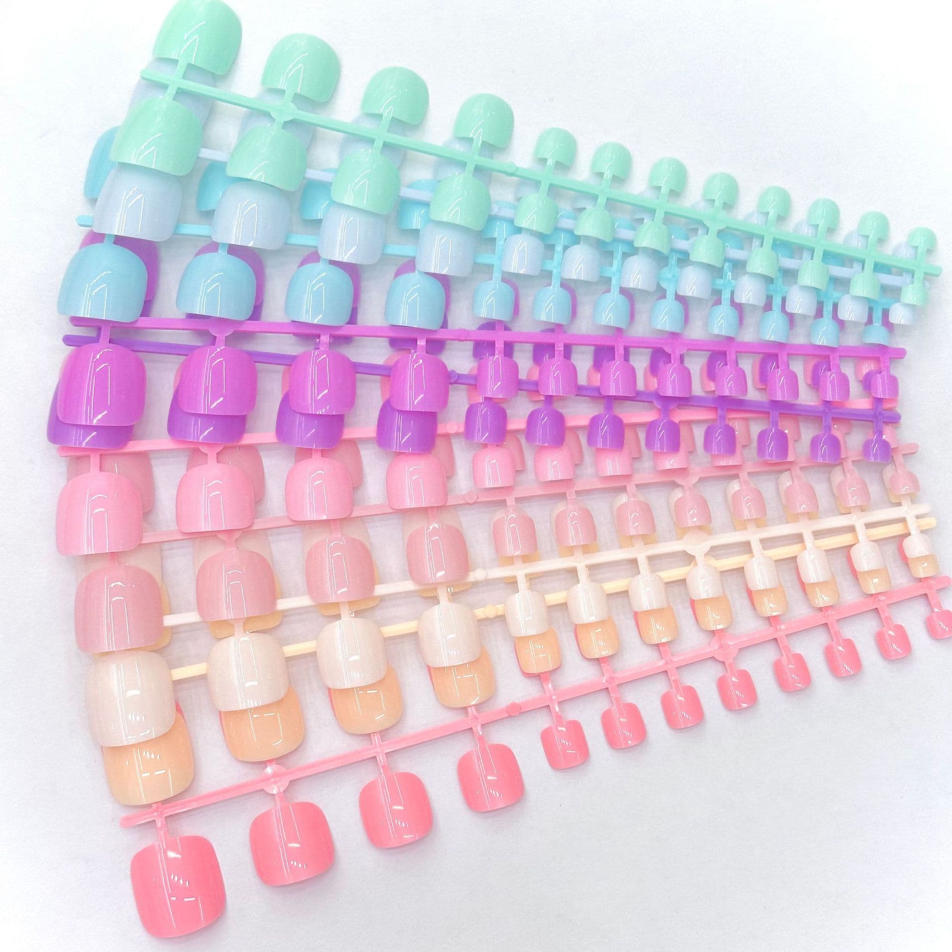 Factory direct sales of colored toenail tips, 24 pieces, rich colors, hot-selling cute nail art for summer.