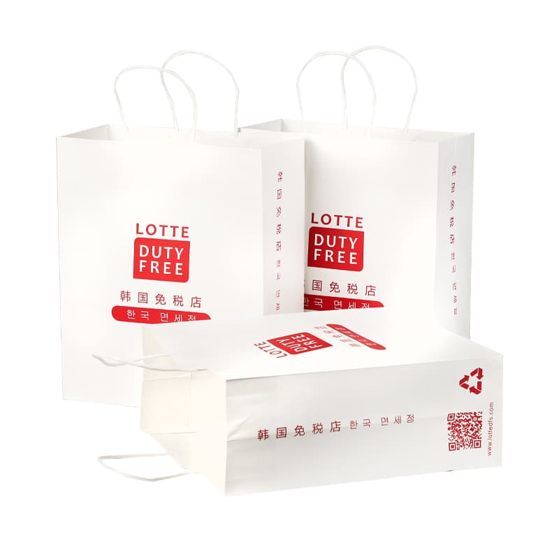 Paper bag custom wholesale printed duty free white kraft paper shopping bag with your own logo with hand