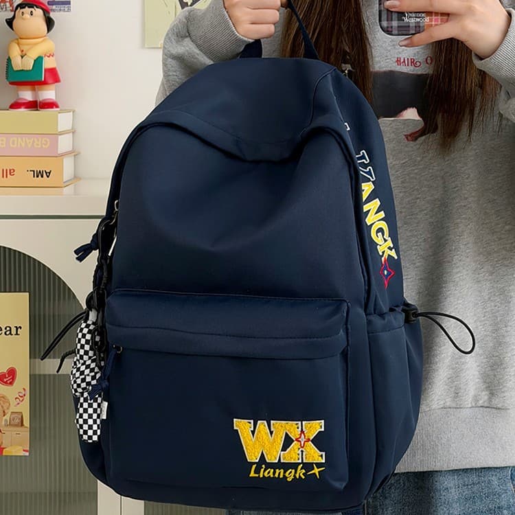 New American-style backpack for middle school, high school, and college students, simple and versatile, large-capacity campus backpack