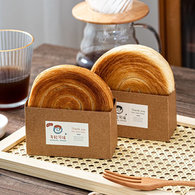 Kraft paper annual ring croissant bread paper tray packed lunch box sandwich baking wheel cake croissant packaging bottom tray