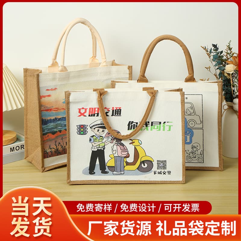 Wholesale jute gift bags with custom laminated handles for promotional advertising gifts, made of jute and cotton.