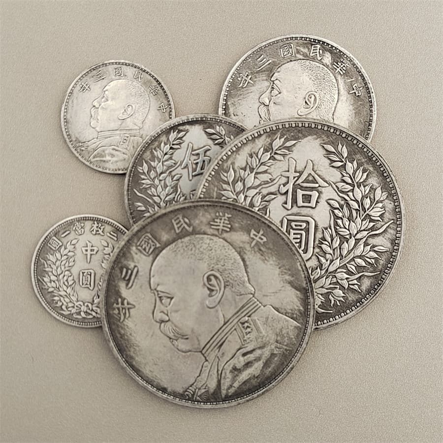 Antique-style Yuan Shikai silver dollar, made of brass plated with silver. A collectible, decorative, and film/television prop. Wholesale coins.