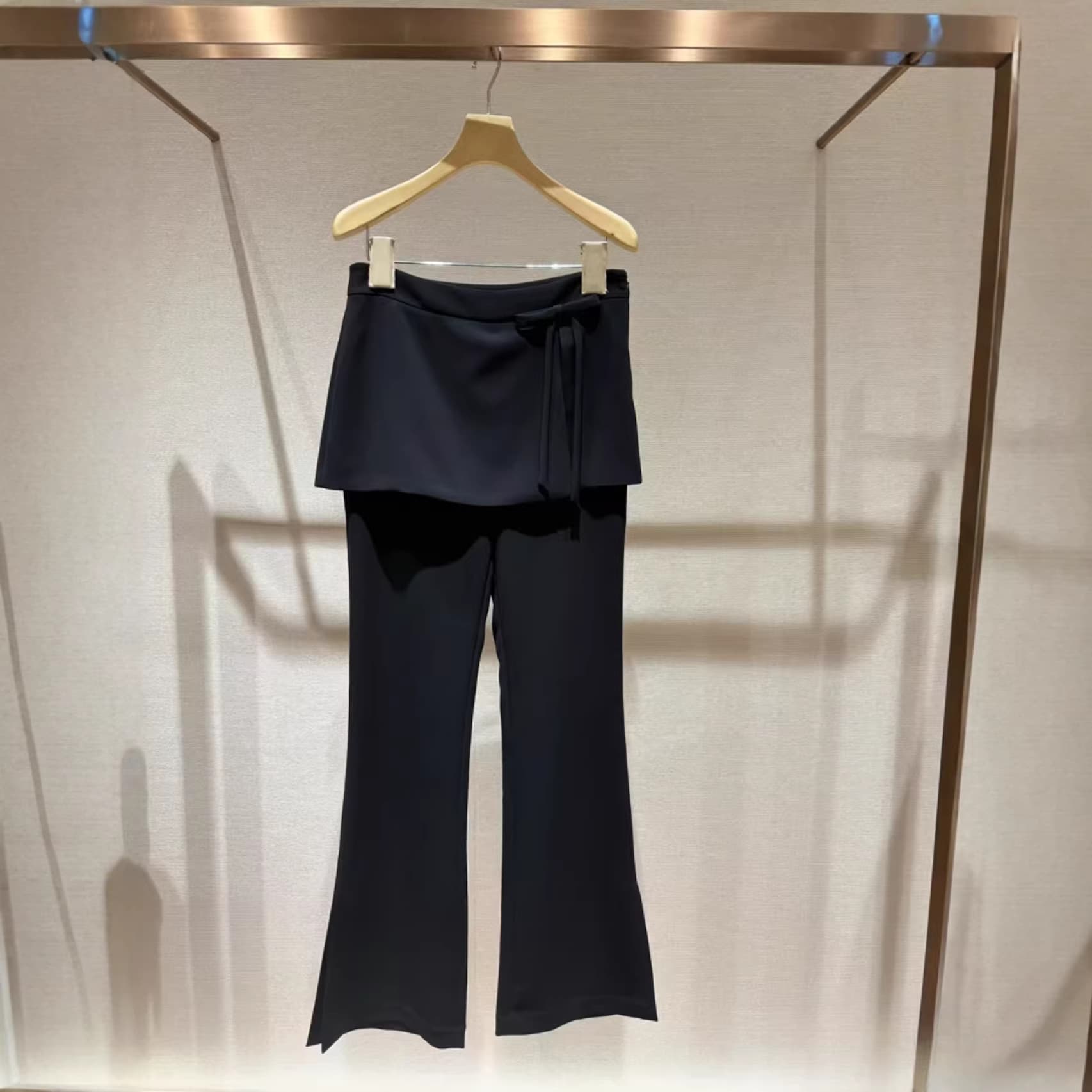 Shenzhen Nanyou commuter style fake two-piece black bootcut pants for women 2026 new summer slimming temperament casual trousers